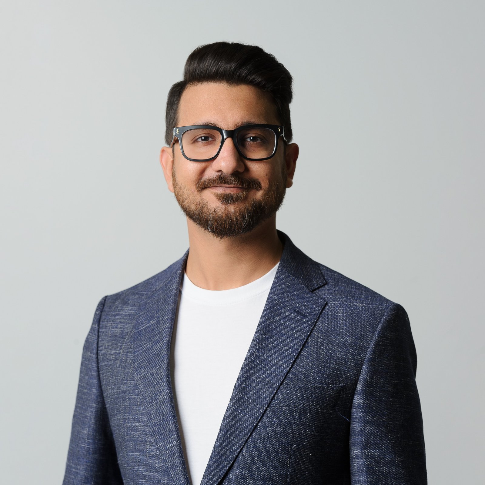 Portrait of Shrey Sharma wearing a blue blazer